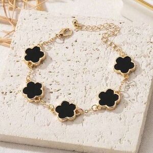 Elegant Gold and Black Flower Bracelet